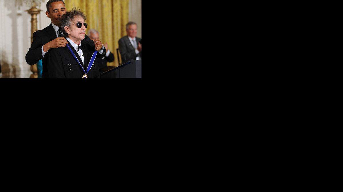 President Barack Obama awards rock legend Bob Dylan the Presidential Medal of Freedom.