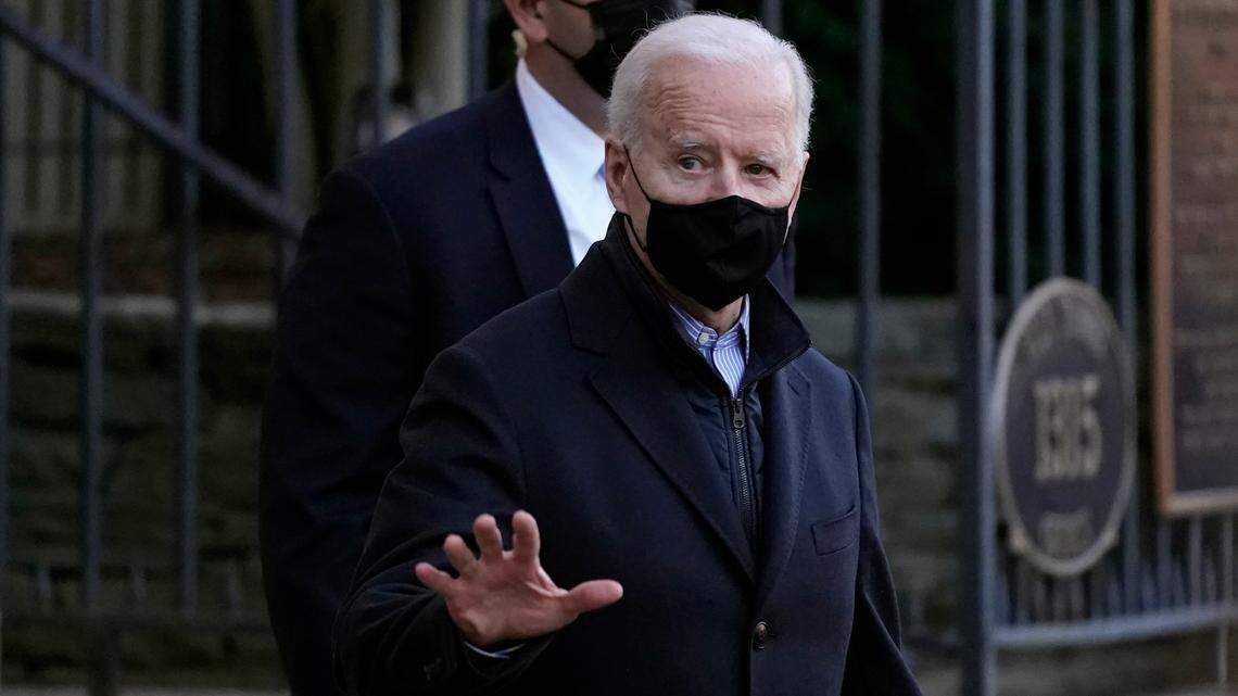 President Joe Biden departs after attending Mass at Holy Trinity Catholic Church in the Georgetown neighborhood of Washington, Saturday, March 6, 2021. He signed an executive order Sunday aimed at expanding voting rights. (AP Photo/Patrick Semansky)