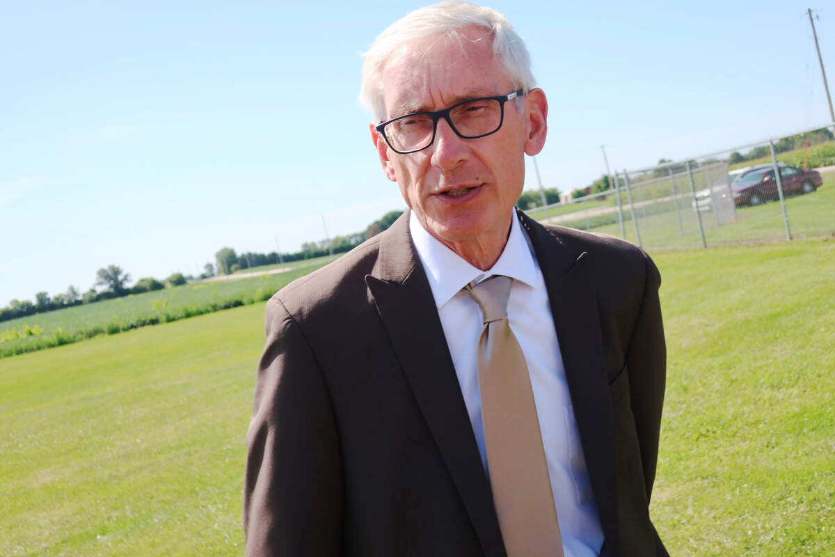 Gov. Tony Evers speaks to reporters on Thursday, Aug. 29, 2019, in Beaver Dam, Wisconsin. Evers says he’s awaiting a recommendation from his legal team about when to call a special election for the congressional district being vacated by retiring Republican Rep. Sean Duffy. (AP Photo/Scott Bauer)