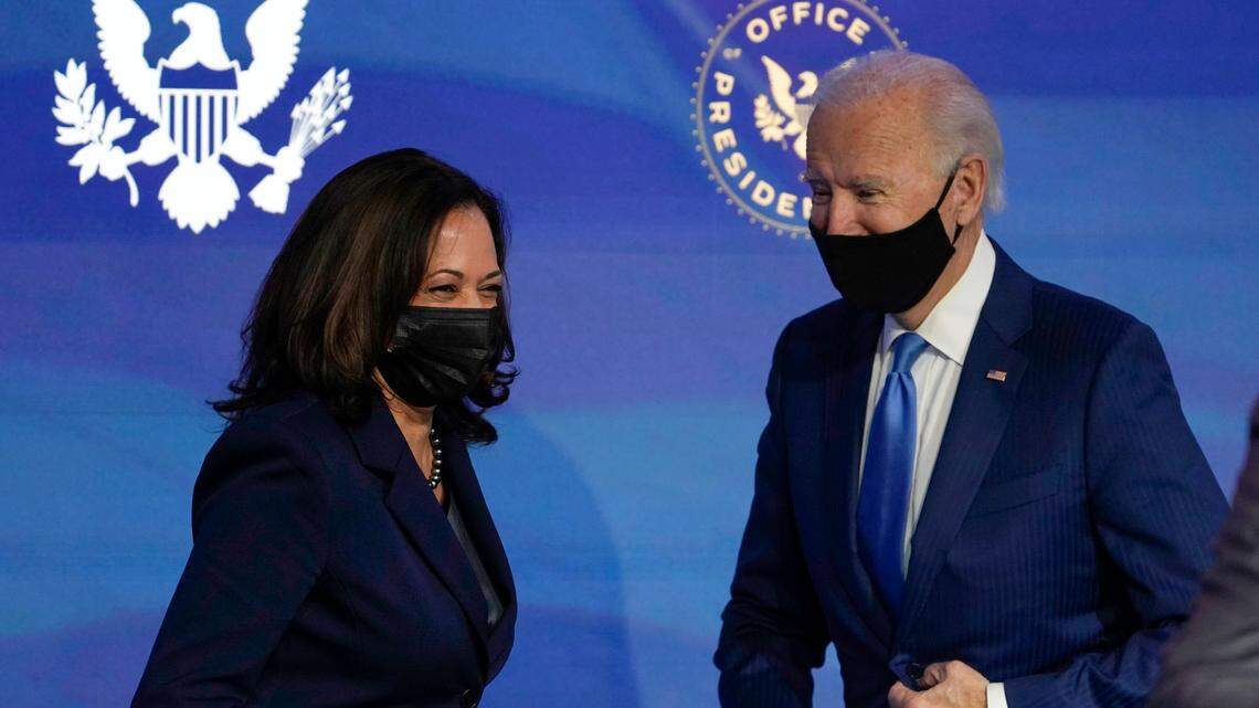President-elect Joe Biden, right, and Vice President-elect Kamala Harris, left, share a laugh during an event to announce several choices for positions in the Biden administration at The Queen theater in Wilmington, Del., Friday, Dec. 11, 2020. Here’s how to watch their inauguration on Jan. 20. (AP Photo/Susan Walsh)