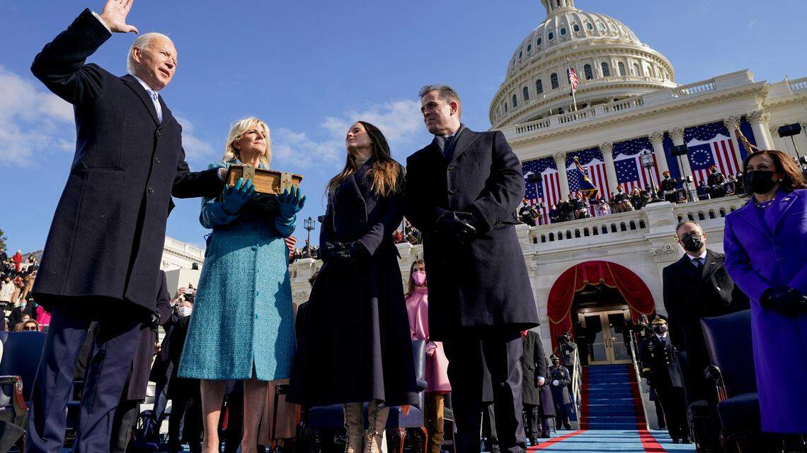 Joe Biden is sworn in as the 46th president of the United States by Chief Justice John Roberts as Jill Biden holds the Bible during the 59th Presidential Inauguration at the U.S. Capitol in Washington, Wednesday, Jan. 20, 2021, as their children Ashley and Hunter watch. Nearly 33.8 million people tuned into his inauguration, Nielsen says.