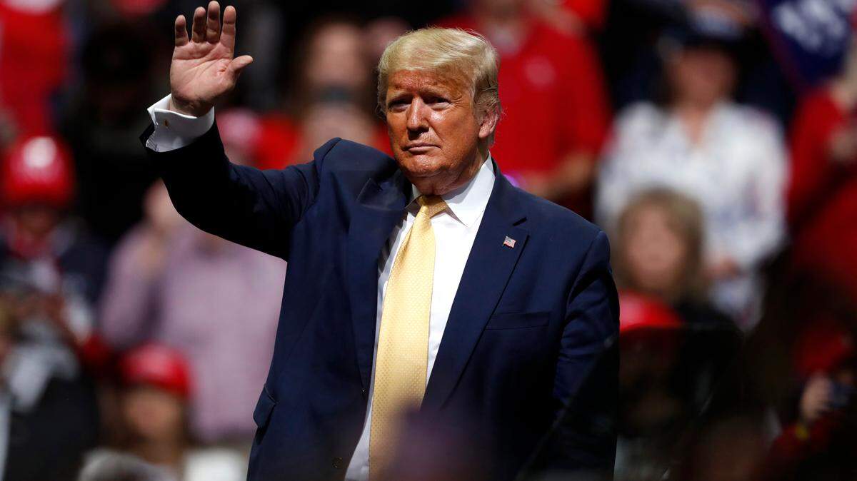 President Donald Trump waves at a campaign rally Thursday, Feb. 20, 2020, in Colorado Springs, Colo. (AP Photo/David Zalubowski)