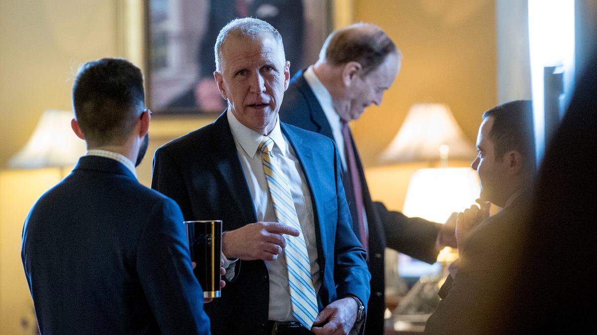 Sen. Thom Tillis, R-North Carolina, center, and Sen. Richard Shelby, R-Alabama, right, wait for a meeting with Senate Republicans at the office of Senate Majority Leader Mitch McConnell, R-Kentucky, on Capitol Hill in Washington, Jan. 10, 2019.
