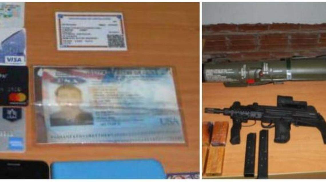 This screenshot of a Venezuelan handout photo shown on the country’s state television channels purports to show the alleged arsenal seized when American Matthew J. Heath and several Venezuelans were arrested in September 2020.