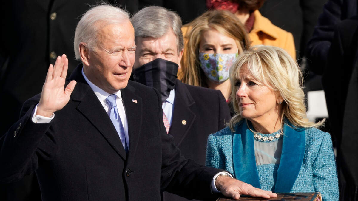 Joe Biden is sworn in as the 46th president of the United States by Chief Justice John Roberts as Jill Biden holds the Bible during the 59th Presidential Inauguration at the U.S. Capitol in Washington, Wednesday, Jan. 20, 2021. (AP Photo/Andrew Harnik)