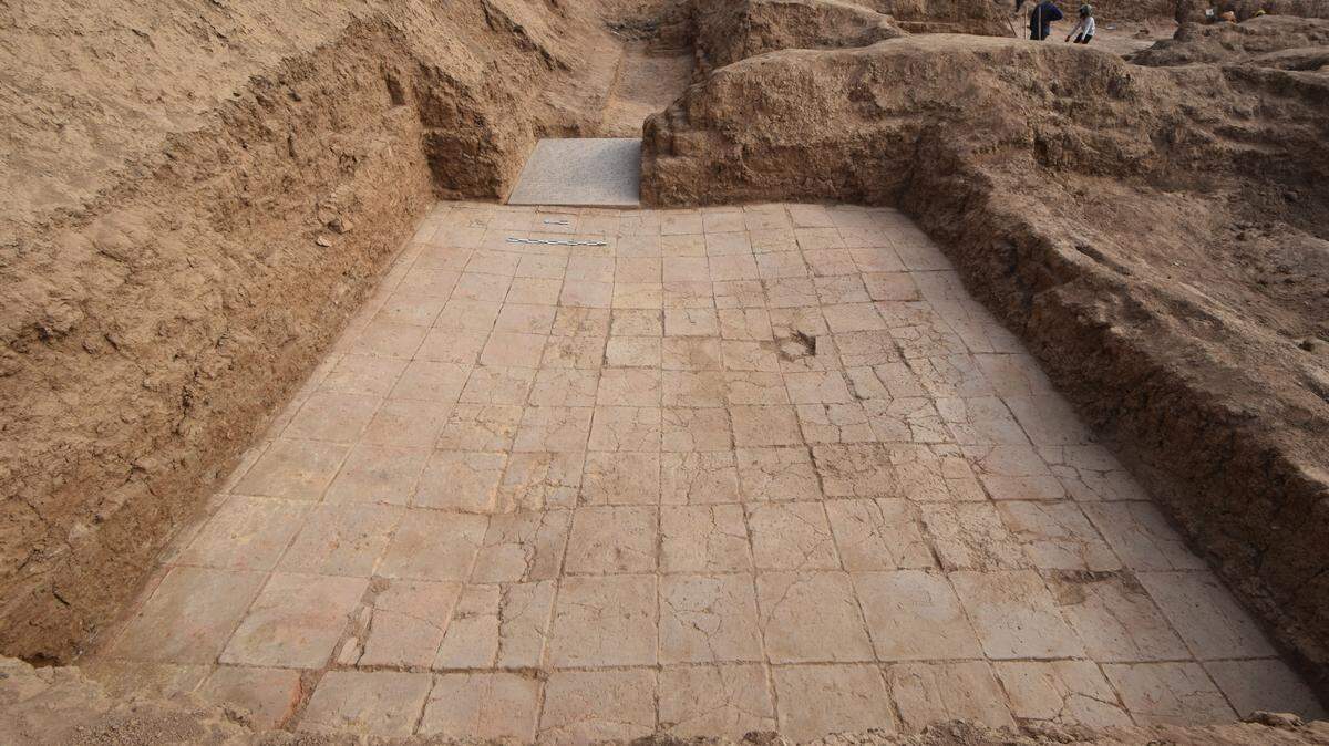Archaeologists excavating an ancient Assyrian palace in Nimrud found a door sill, carved ivory and ostrich eggshells revealing royal life.