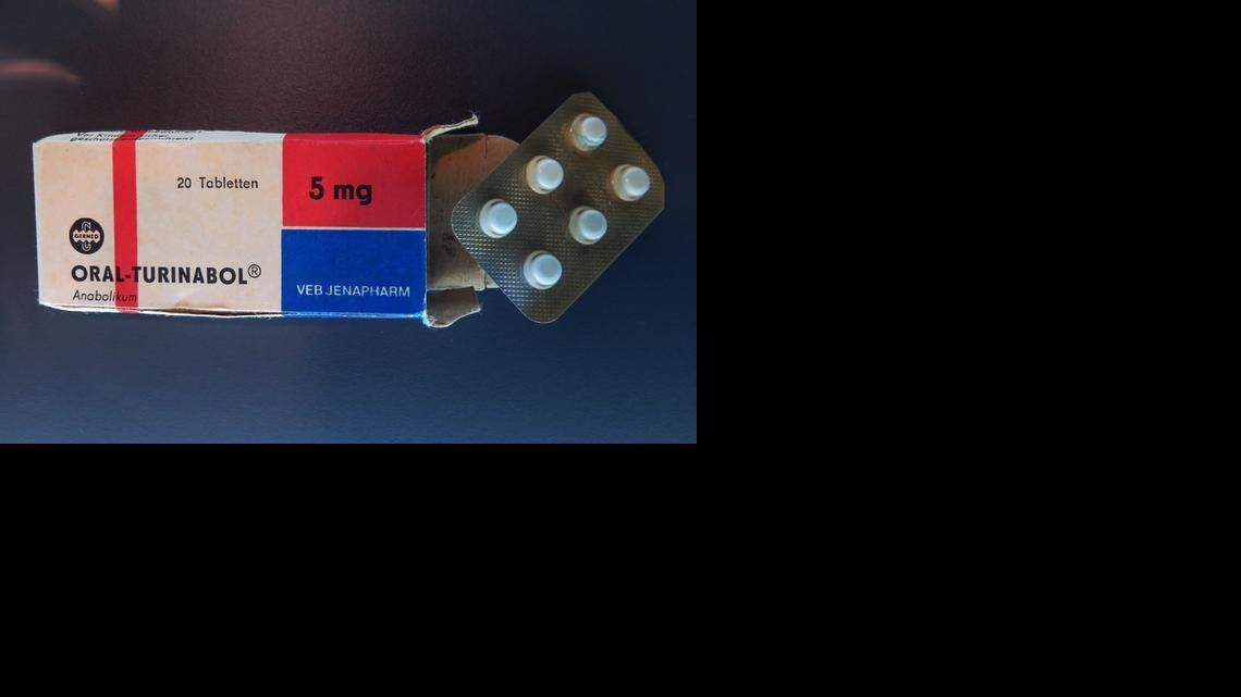 The infamous “blue pills” passed off as vitamins to many young East German athletes during the Stasi secret police-run program to produce better national sports results between 1966 and the reunification of Germany in 1990. The pills were photographed Berlin’s DDR Museum. 
