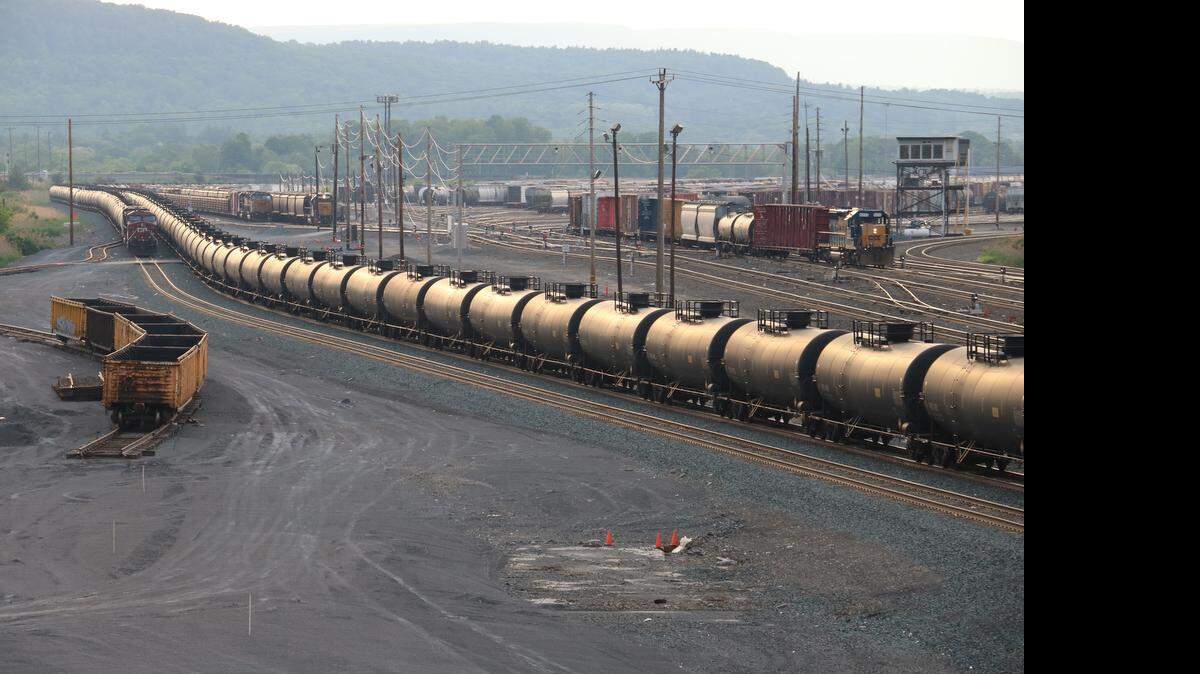 A CSX oil train moves east through Selkirk Yard near Albany, N.Y., on May 26, 2015. The Albany area has become a hub for crude by rail shipments as East Coast refineries have replaced imported oil with mid-continent sources. CSX and other railroads continue their push to keep routing and volume information about the shipments from the public.
