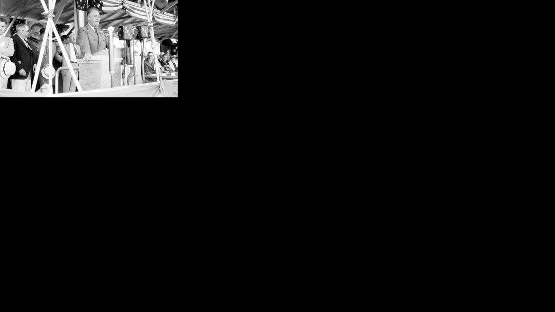 On August 4, 1934, approximately 20,000 people gathered at the future site of the Grand Coulee dam to hear Franklin D. Roosevelt give a speech.