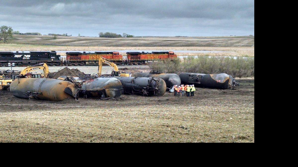 A BNSF train passes the site of a derailment in Heimdal, N.D., on Friday, May 8, 2015. On Wednesday, May 6, an oil train derailed here, and several cars caught fire. No one was injured.
