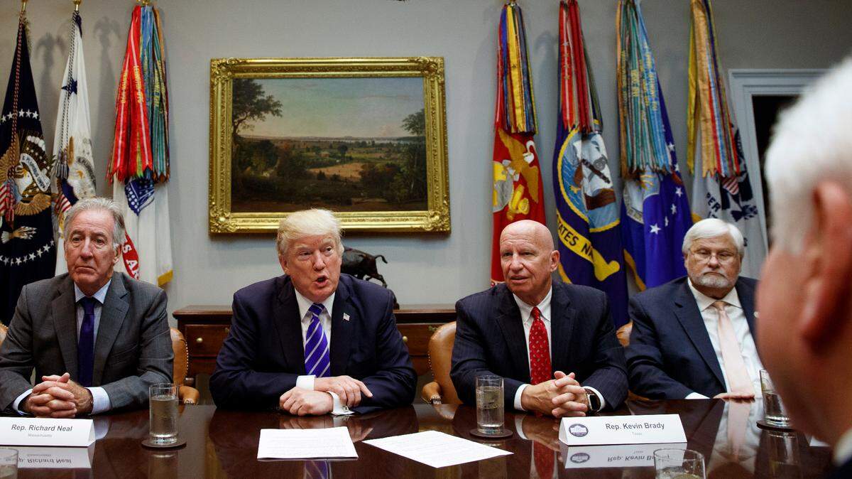 President Donald Trump speaks during a meeting with members of the House Ways and Means committee in the Roosevelt Room of the White House, Sept. 26, 2017, in Washington. From left, Rep. Richard Neal, D-Mass., Trump, Rep. Kevin Brady, R-Texas, and Rep. Kenny Marchant, R-Texas.