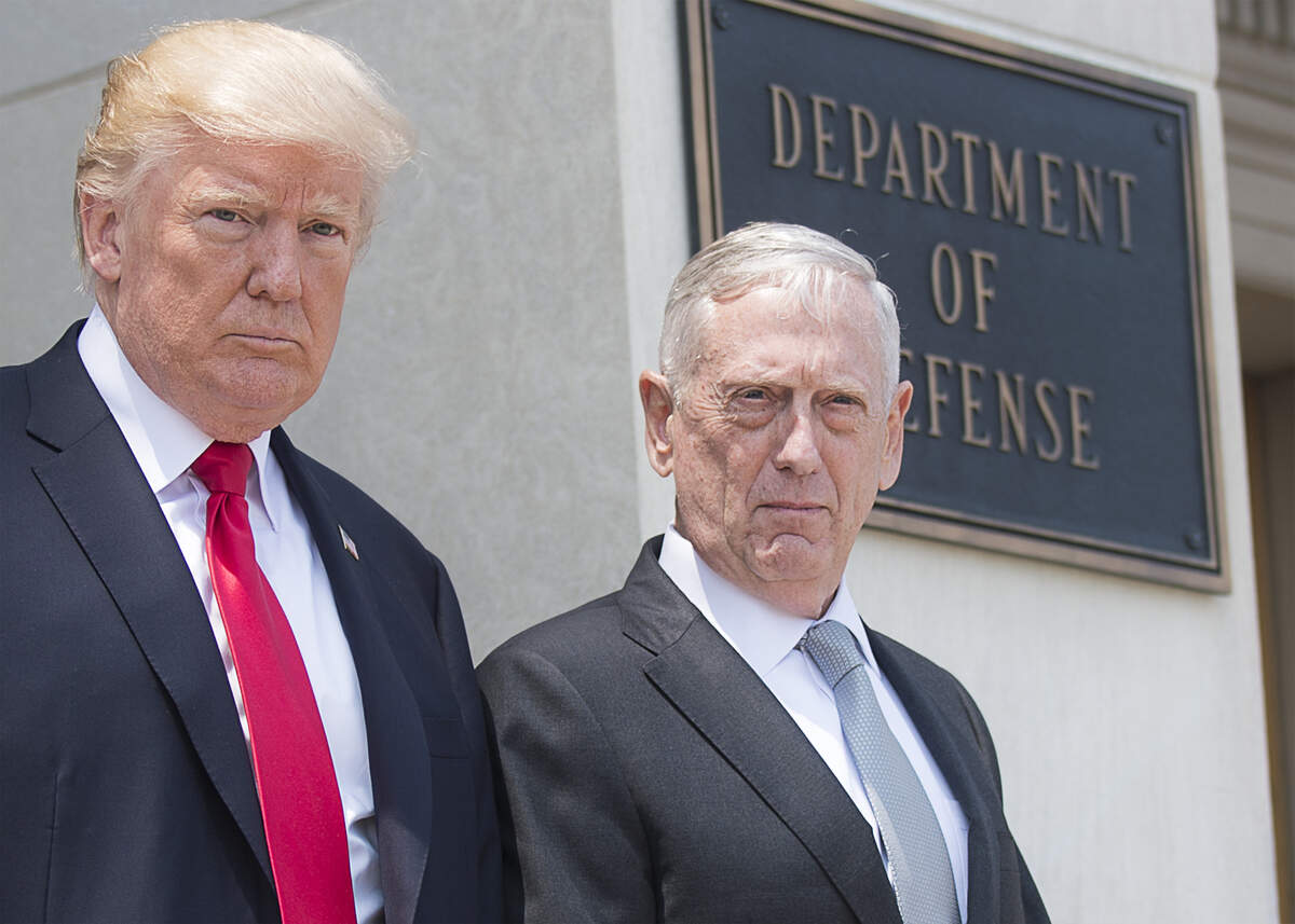 Secretary of Defense Jim Mattis, shown here in 2017 with President Donald Trump, wrote in The Atlantic Wednesday that Trump’s use of force against protesters and other decisions the president has made over his term are unconstitutional.