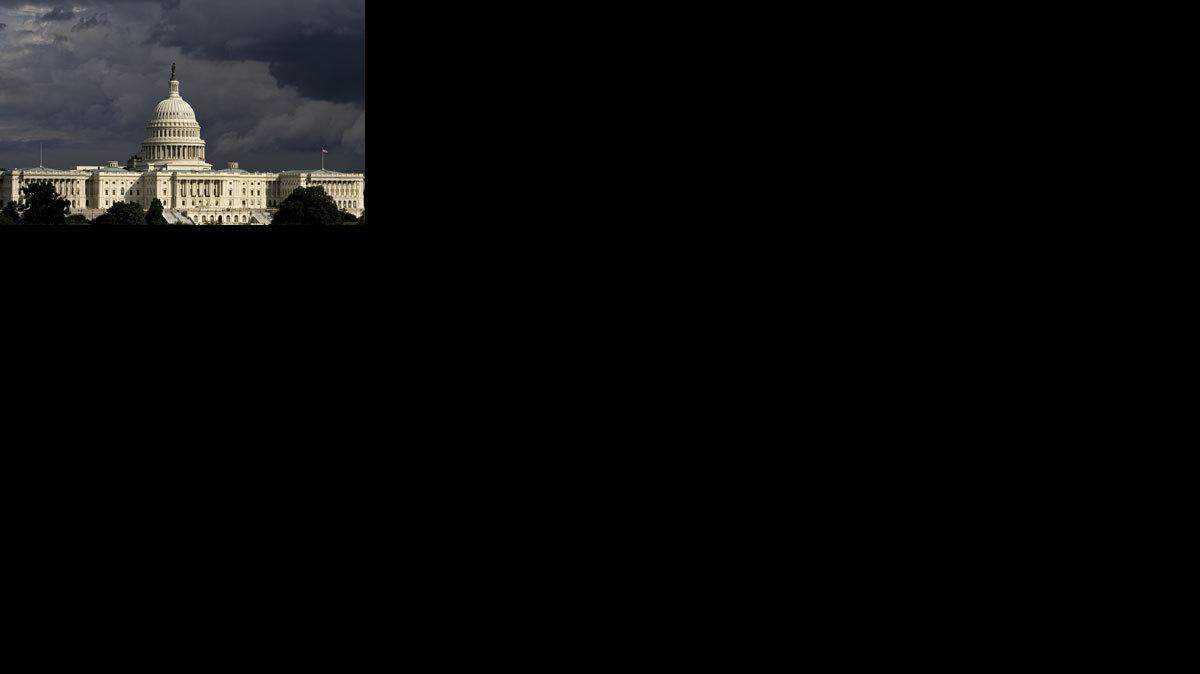 The U.S. Capitol framed by a late summer storm. Congress is meeting on the financial bailout.