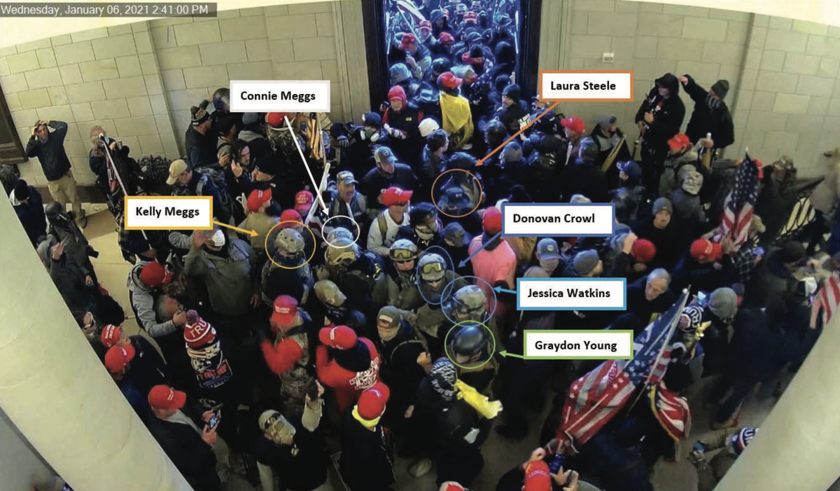 A screenshot from surveillance video captured inside the U.S. Capitol on Jan. 6, 2021, shortly after the Rotunda doors were breached, with multiple individuals identified, including Florida leader Kelly Meggs and his wife, Connie.