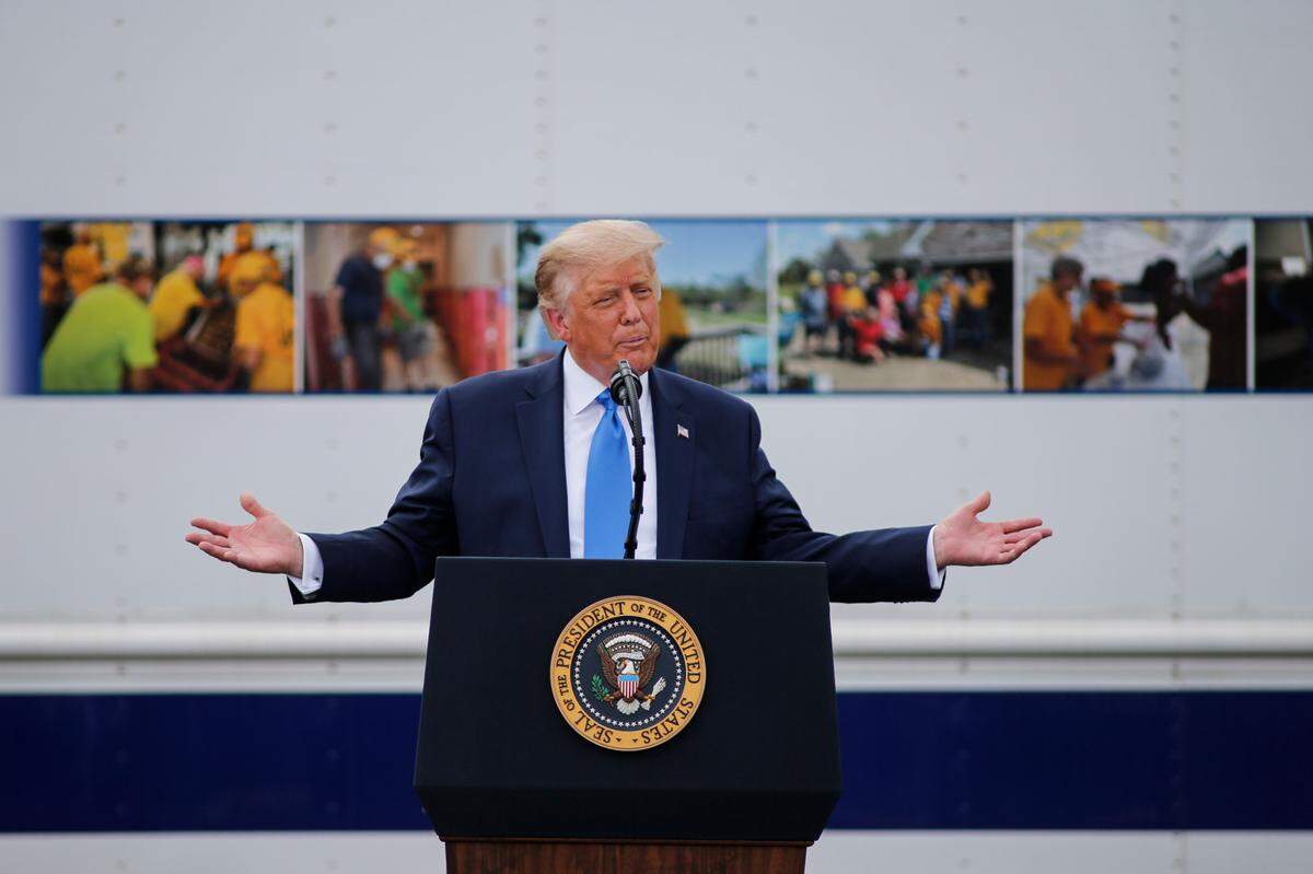 President Donald Trump speaks at Flavor First Growers & Packers in Mills River, N.C., Monday, Aug. 24, 2020. (AP Photo/Nell Redmond)