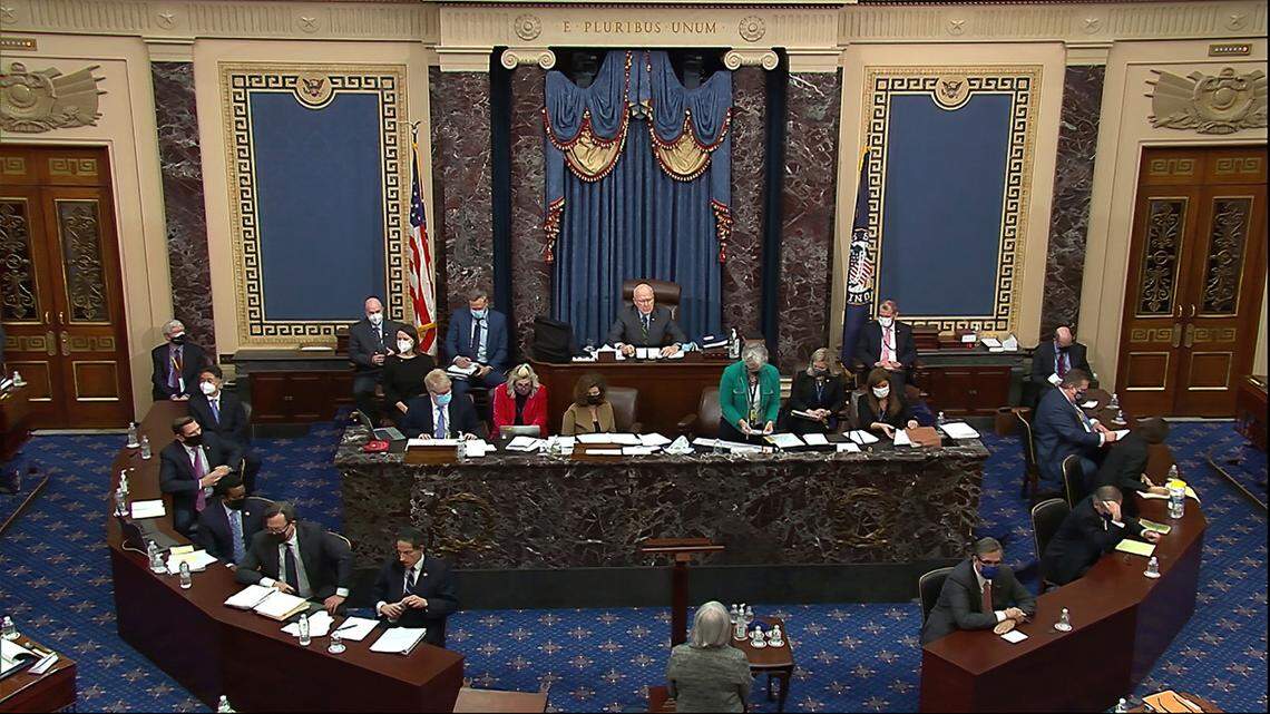 In this image from video, the clerk read the impeachment charge to senators before they vote during the second impeachment trial of former President Donald Trump in the Senate at the U.S. Capitol in Washington, Saturday, Feb. 13, 2021. Some House impeachment managers have said calling witnesses during the trial wouldn’t have changed the outcome. (Senate Television via AP)