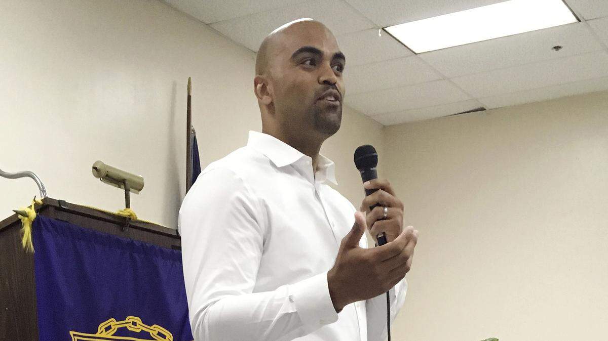 Democratic congressional candidate Colin Allred, a former NFL linebacker and civil rights attorney, addresses a town hall in Dallas.