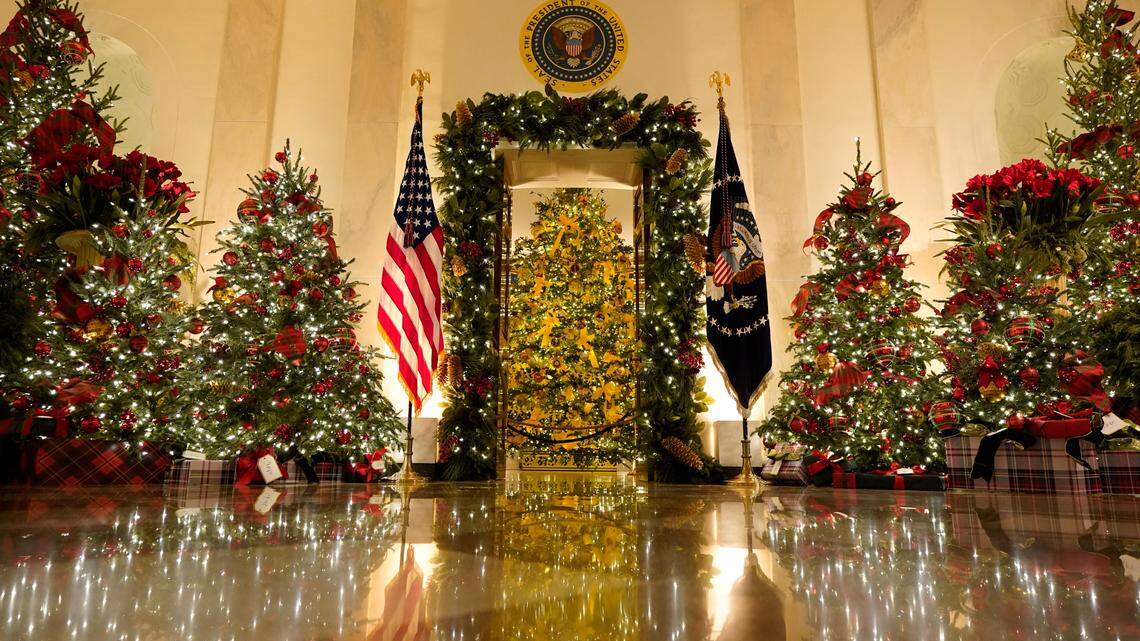 Cross Hall and the Blue Room are decorated during the 2020 Christmas preview at the White House, Monday, Nov. 30, 2020, in Washington. (AP Photo/Patrick Semansky)
