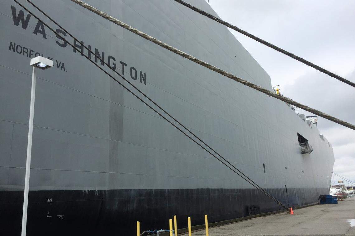 The Cape Washington, a part of the U.S. Ready Reserve Force, sits at a pier in Baltimore, on standby as a roll-on roll-off ship to take Humvees, tanks and helicopters to a foreign battlefield.
