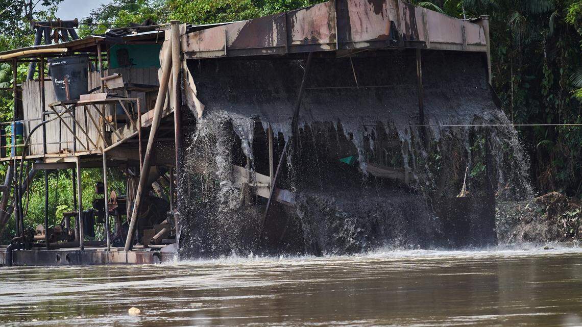 Gold-mining dredges, called dragons, like this one photographed in 2020 in Rio Quito in western Colombia lift the river bed and destroy river banks to collect material that is going to be ground, crushed and sieved to separate the gold particles from minerals. Mercury is added, helping separate the gold but the excess flows into and contaminates rivers., often a source of drinking water.