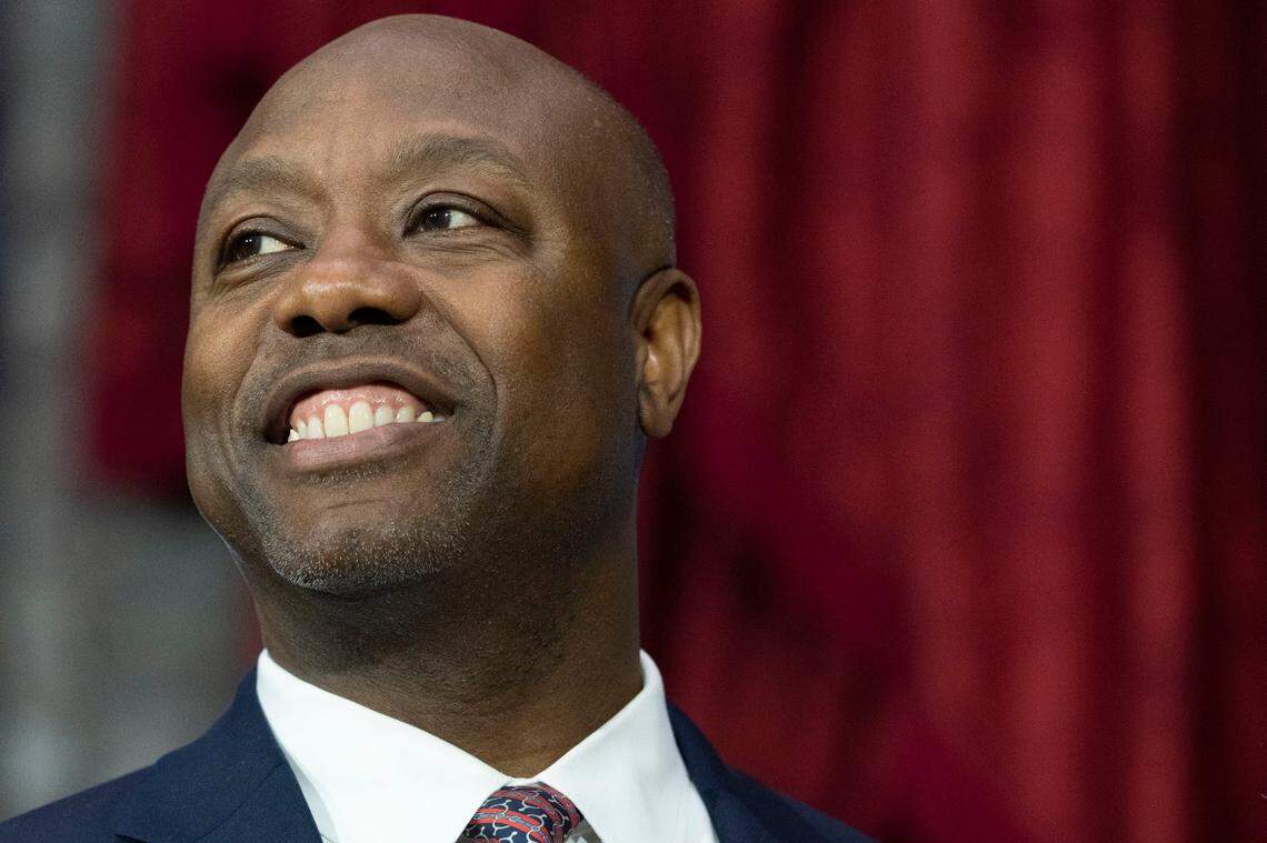 Sen. Tim Scott, R-S.C., participates in his ceremonial swearing-in by Vice President Kamala Harris, in the Old Senate Chamber on Capitol Hill in Washington, Tuesday, Jan. 3, 2023. (AP Photo/Jacquelyn Martin)