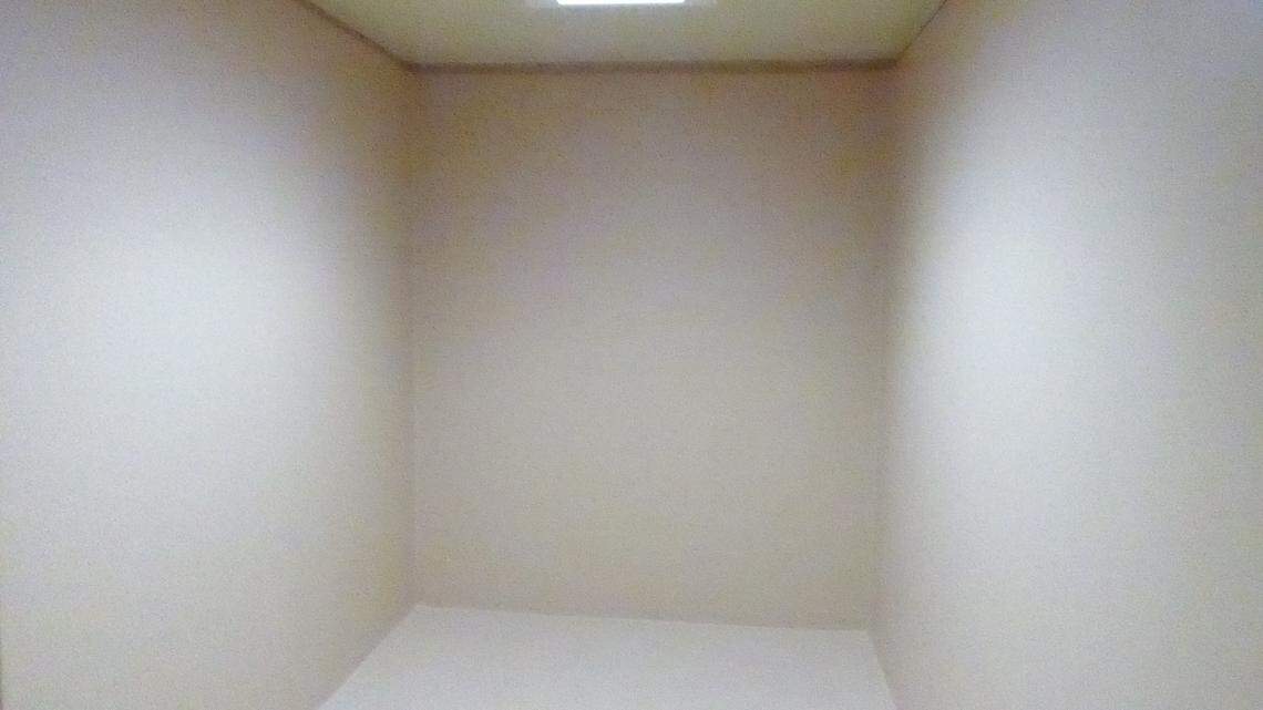 The padded cell for psychiatric patients at Camp 5, a health clinic serving about two dozen low-value detainees, as shown to reporters for the first time on Oct. 16, 2018 in a photo approved for release by the U.S. military.  One of three psychiatrists on the staff of the 40-captive prison said at-risk captives at the psychiatric ward, called a Behavioral Health Unit, can opt to go in the cell stripped off bed, sink and toilet for 10-20 minutes if they are feeling overwhelmed.