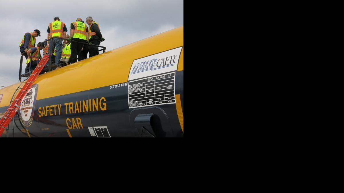 First responders participate in a CSX training course in Richmond, Va., on Oct. 3, 2014. CSX brought its "Safety Train" to Richmond and 18 other cities last year to help emergency responders become familiar with railroad equipment, including tank cars and locomotives. The train's next stop after Richmond was South Charleston, W.Va. A number of departments that responded to last week's oil train derailment in West Virginia had received training in October.
