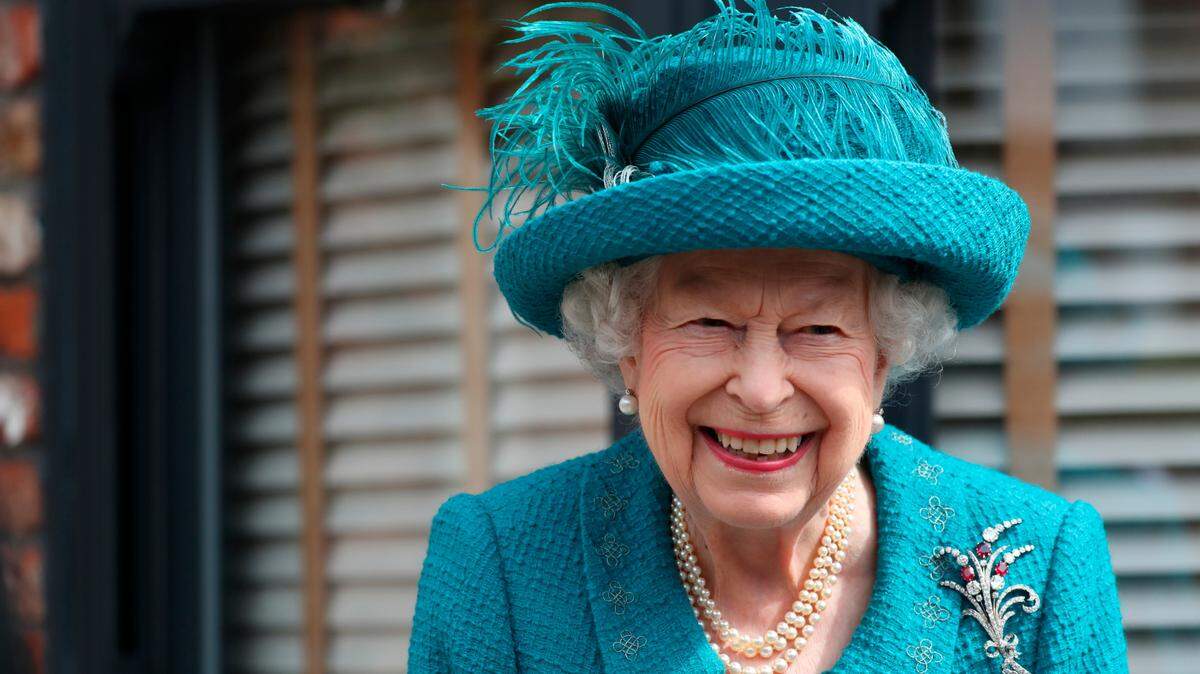 Britain’s Queen Elizabeth II visits the set of the long running television series Coronation Street, in Manchester, England, Thursday July 8, 2021.