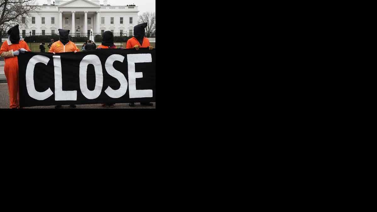Amnesty International and other organizations hold a rally in front of the White House in Washington, D.C., January 11, 2011, to urge President Obama to close the U.S.-controlled detention center in Guantanamo Bay, Cuba on its 9th anniversary. (Olivier Douliery/Abaca Press/MCT)