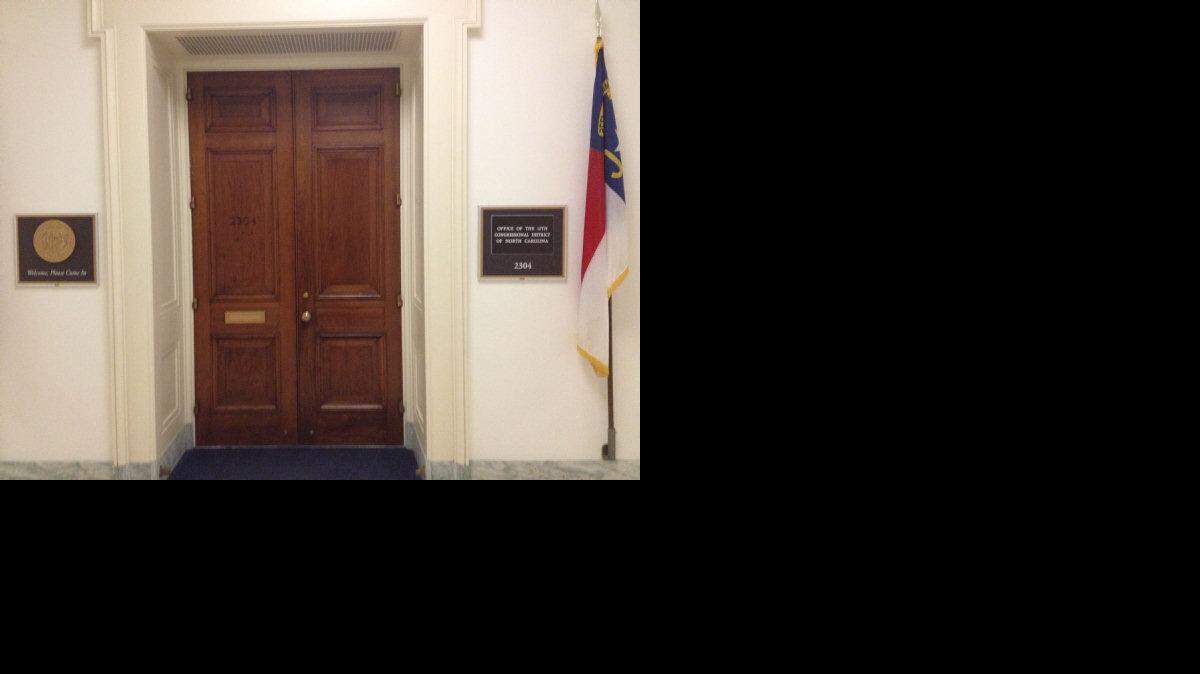 Former Rep. Mel Watt's fancy nameplate has been removed and replaced with a more basic N.C. district sign.  Washington, D.C. January 30, 2014. Franco Ordonez/MCT