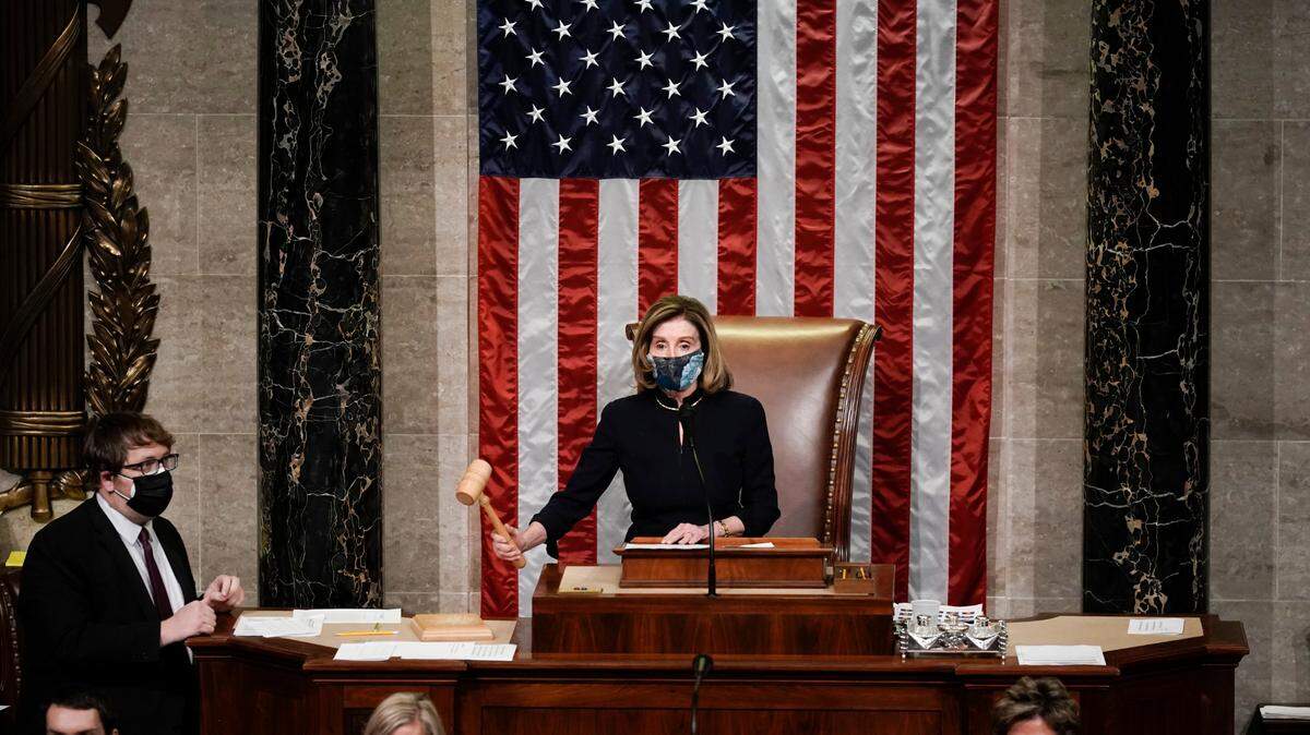 Speaker of the House Nancy Pelosi, D-Calif., gavels in the final vote of the impeachment of President Donald Trump, for his role in inciting an angry mob to storm the Congress last week, at the Capitol in Washington, Wednesday, Jan. 13, 2021. Trump’s impeachment received the most support from members of his own party than any other presidential impeachment in history.