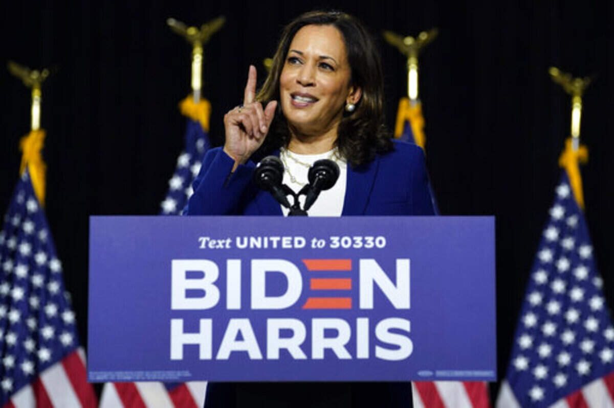 Sen. Kamala Harris, D-Calif., speaks after Democratic presidential candidate former Vice President Joe Biden introduced her as his running mate during a campaign event at Alexis Dupont High School in Wilmington, Del., Wednesday, Aug. 12, 2020. (AP Photo/Carolyn Kaster)