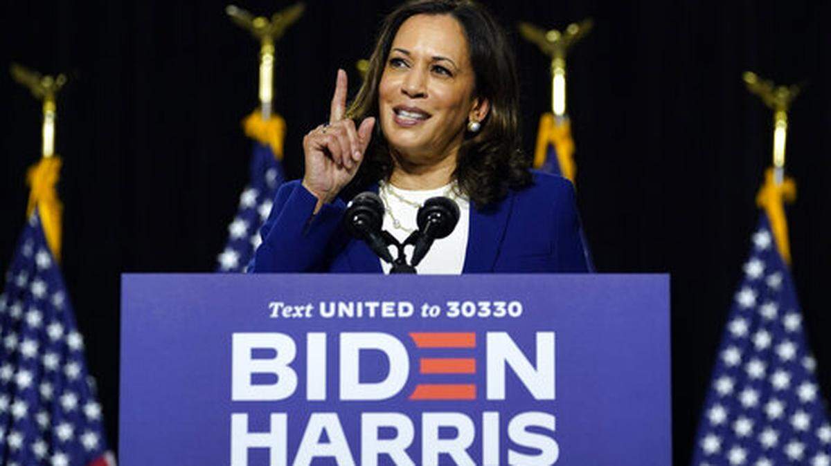 Sen. Kamala Harris, D-Calif., speaks after Democratic presidential candidate former Vice President Joe Biden introduced her as his running mate during a campaign event at Alexis Dupont High School in Wilmington, Del., Wednesday, Aug. 12, 2020. (AP Photo/Carolyn Kaster)