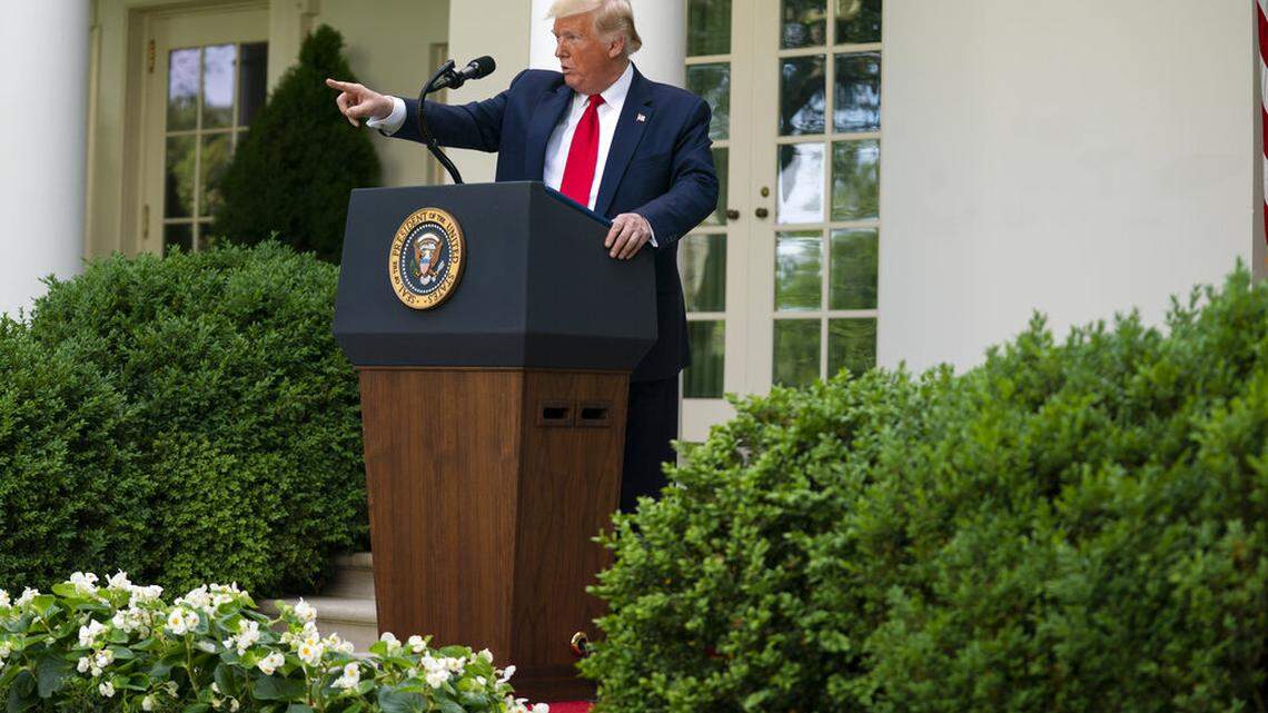 Trump criticizes reporter in mask, despite his administration’s coronavirus guideline