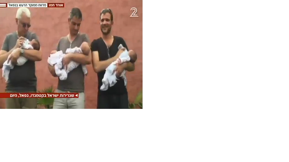 In Kathmandu, Israeli Tal Bousidan, center, clutched his infant born to a surrogate mother in Nepal in this frame grab from an interview with Israel's Channel 2, flanked by other fathers. Israel flew 26 babies out of Nepal after Saturday's earthquake.

