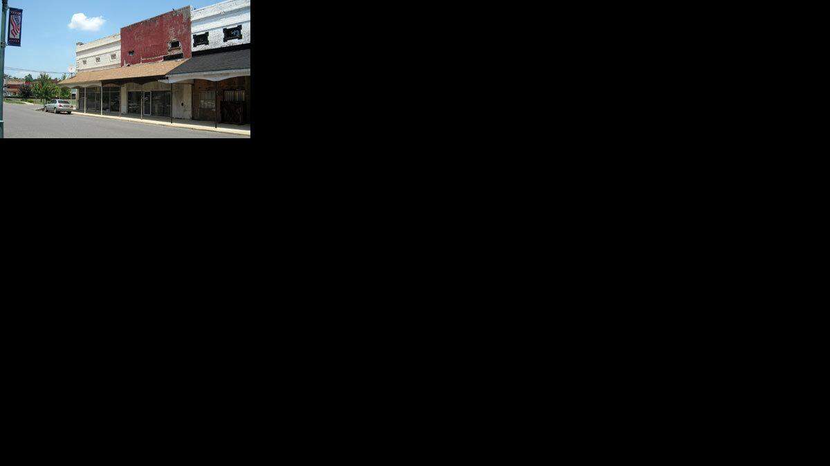 Vacant storefronts dot the streetscape in Prescott, Arkansas.