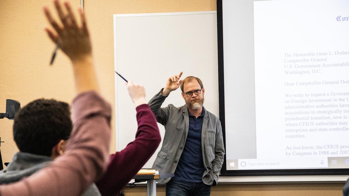 Professor Mark Nance delivers a lecture on financial governance Thursday, Nov. 15, 2018 at North Carolina State University. Some teachers are adapting to new questions and others are developing new courses in the polarized age of Trump.