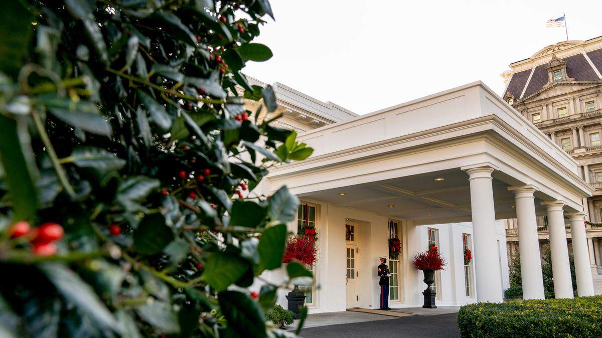 A Marine stands outside the entrance to the West Wing of the White House, signifying the President is in the Oval Office, Tuesday, Dec. 22, 2020, in Washington. For decades, departing presidents have left their successors a letter on Inauguration Day. (AP Photo/Andrew Harnik)
