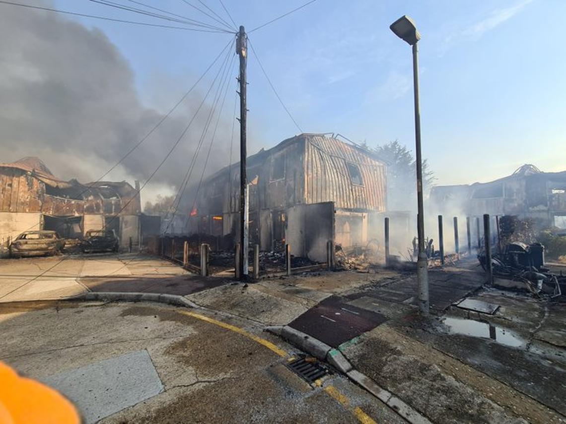 Large fires in London destroyed homes, vehicles, and grasslands as the UK struggled under Europe’s deadly heat wave.