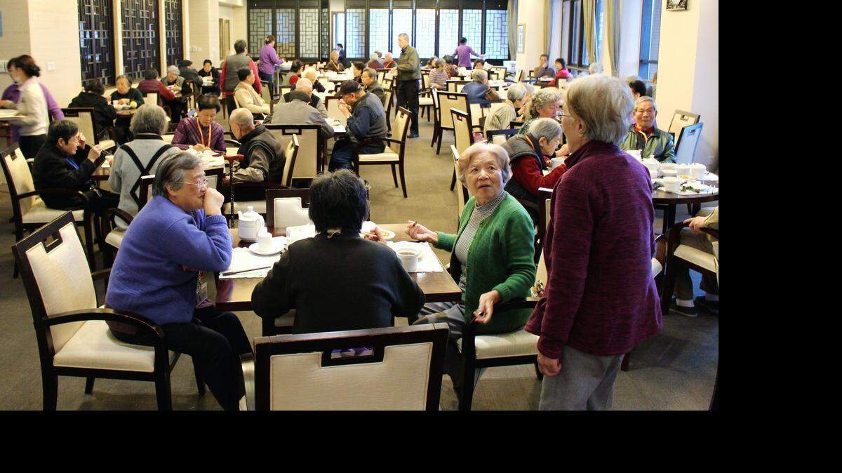 Residents of Xing Bao, a retirement community known as Xing Bao in English, gather for lunch in the facility's restaurant in Shanghai, China on Mar. 26, 2015. Xing Bao caters to well-to-do Chinese interested in a retirement option that, until recent years, was almost unknown in China. Residents pays the equivalent of $2,000 each per month for independent living units, which includes full meals, housekeeping, use of the gym, spa, tea house, mahjong rooms and other amenities. The vast majority of Chinese could never afford such an option for their golden years, but some can, and US companies are jumping into the market. Xing Bao is a joint venture between US-based Fortress Investment Group and Fosun, a Chinese financial giant.
