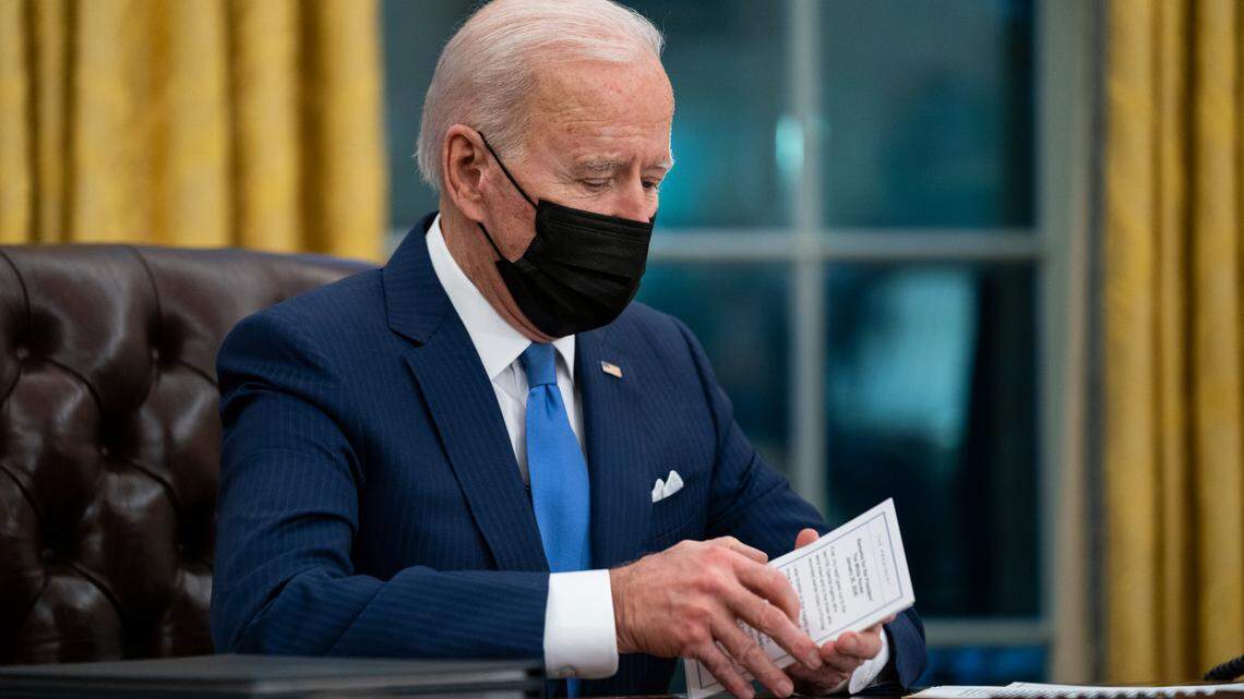 FILE - In this Feb. 2, 2021, file photo President Joe Biden delivers remarks on immigration, in the Oval Office of the White House in Washington. His plans to reduce greenhouse gas emissions do not include requiring Americans to cut back on meat consumption despite false claims from some. (AP Photo/Evan Vucci, File)