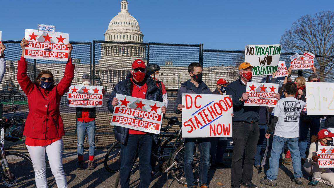 Advocates for statehood for the District of Columbia rally near the Capitol prior to a House of Representatives hearing on creating a fifty-first state, in Washington, Monday, March 22, 2021. (AP Photo/J. Scott Applewhite)