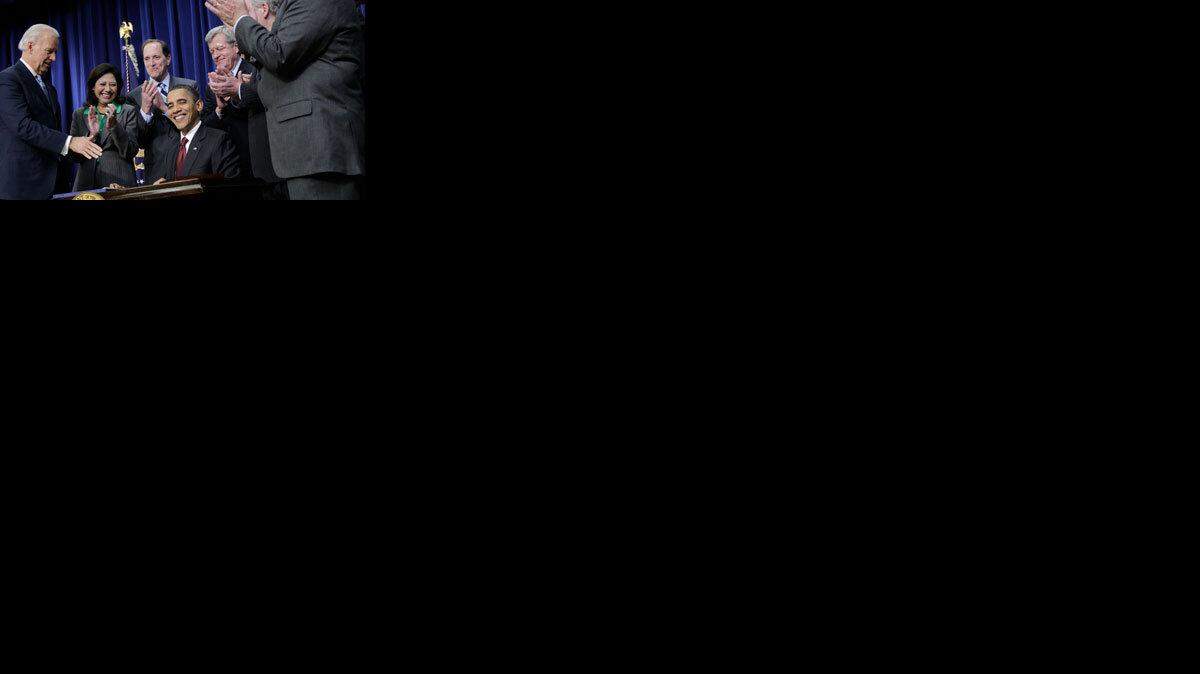 President Obama signs the tax deal