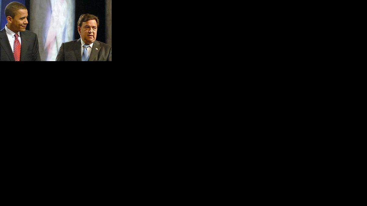 Sen. Obama and Gov. Bill Richardson at the Democratic debate in December 2007