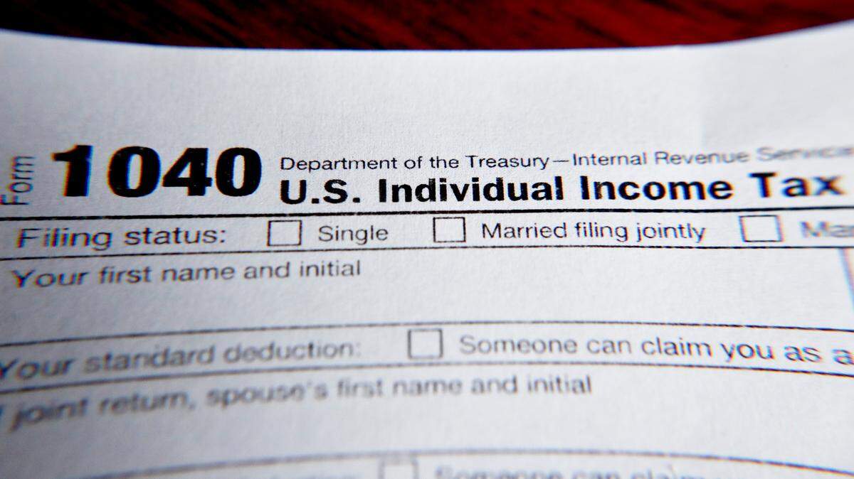 Full state and local tax deductions could return for many taxpayers under a new Senate Democratic plan. (AP Photo/Keith Srakocic, File)