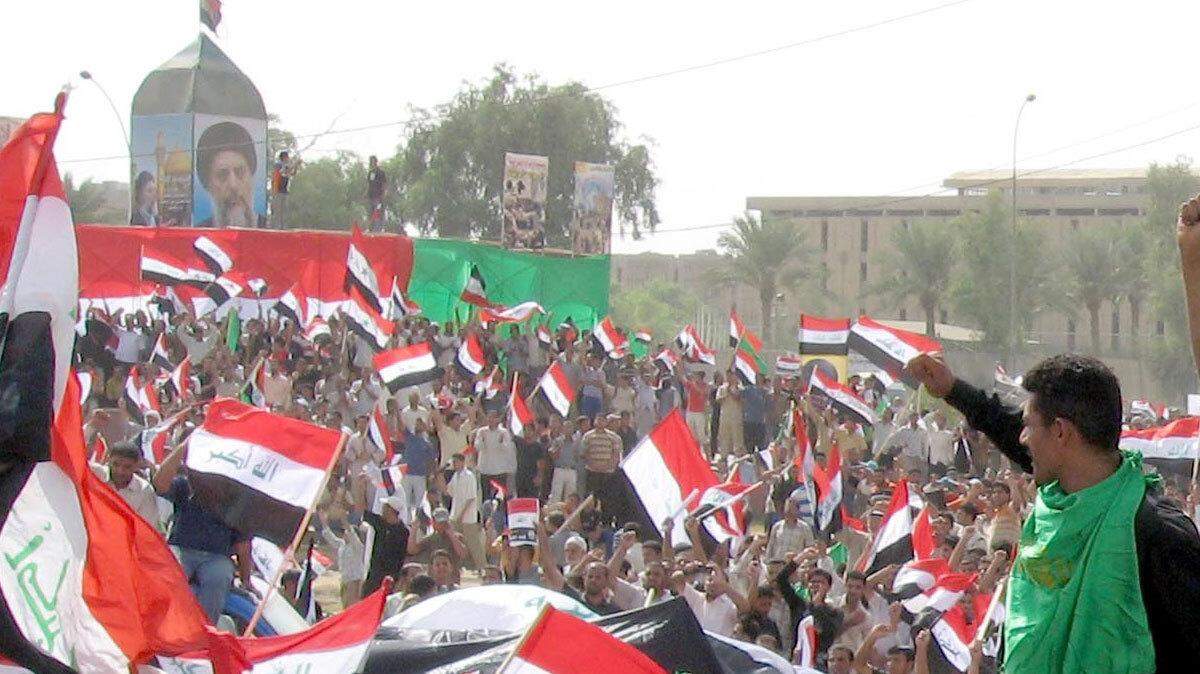 Demonstrators rally in northeast Baghdad Saturday October 18, 2008, against a proposed Iraqi-American agreement that would allow U.S. troops to stay in the country until 2012. (Hussein Kadhim/MCT)