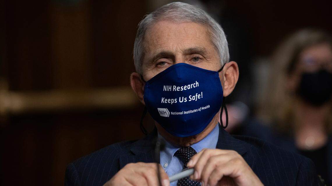 Dr. Anthony Fauci, director of the National Institute of Allergy and Infectious Diseases at the National Institutes of Health, listens during a Senate Senate Health, Education, Labor, and Pensions Committee Hearing on the federal government response to COVID-19 Capitol Hill on Wednesday, Sept. 23, 2020, in Washington. (Graeme Jennings/Pool via AP)