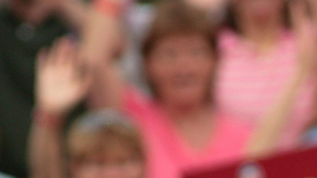 Sen. Barack Obama and Sen. Hillary Clinton take the stage at a rally  in Unity, N.H.