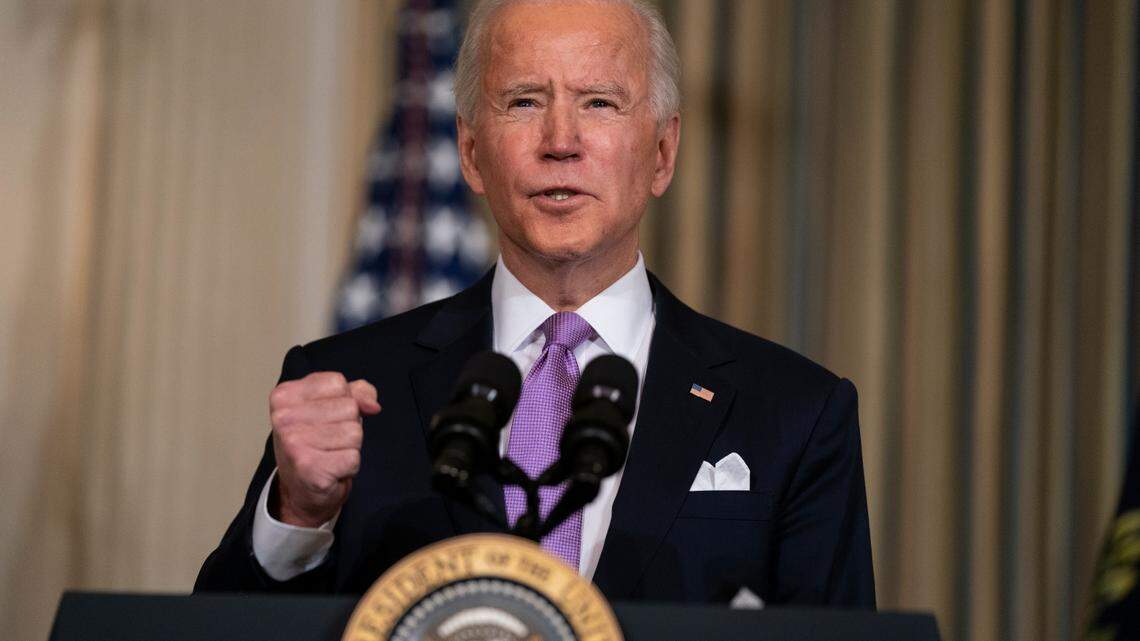 President Joe Biden delivers remarks on racial equity, in the State Dining Room of the White House, Tuesday, Jan. 26, 2021, in Washington.