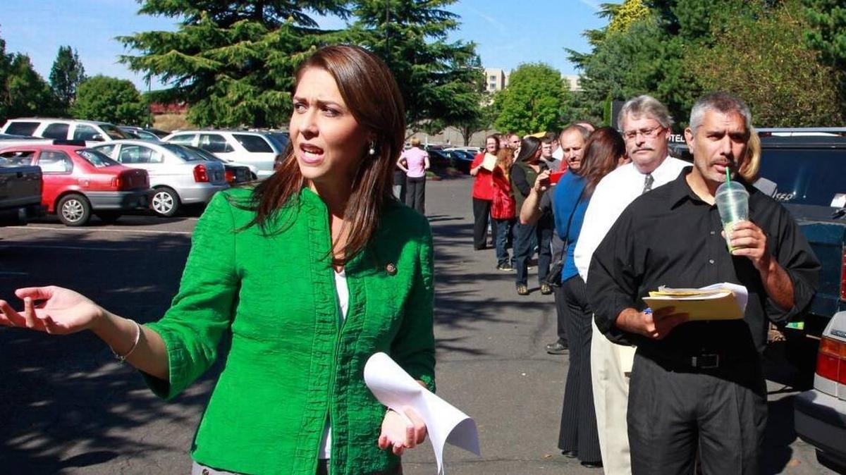 Rep. Jaime Herrera Beutler, R-Wash., speaks with constituents at a job fair in 2012. Herrera Beutler, one of several GOP Hispanic women in Congress, is running against Democrat Carolyn Long in the 2018 midterm election.